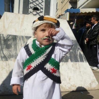 من مظاهرة في بابا عمرو، حمص، قبل أسبوعين. المصدر: الثورة السورية في حمص - تنسيقية بابا عمرو على فيسبوك